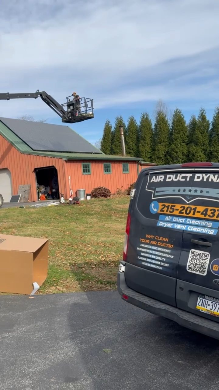 Air Duct Dynasty service van parked at a customer property
