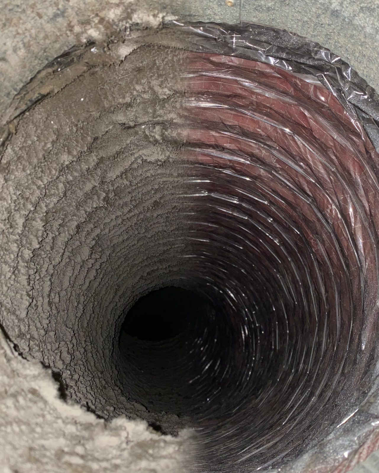 Interior of a residential air duct after professional cleaning