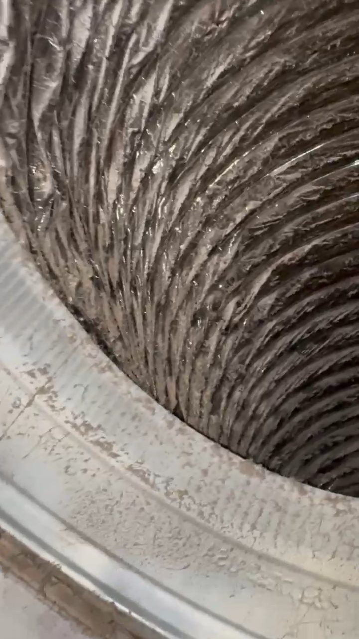 Air duct opening showing a ring of accumulated dust