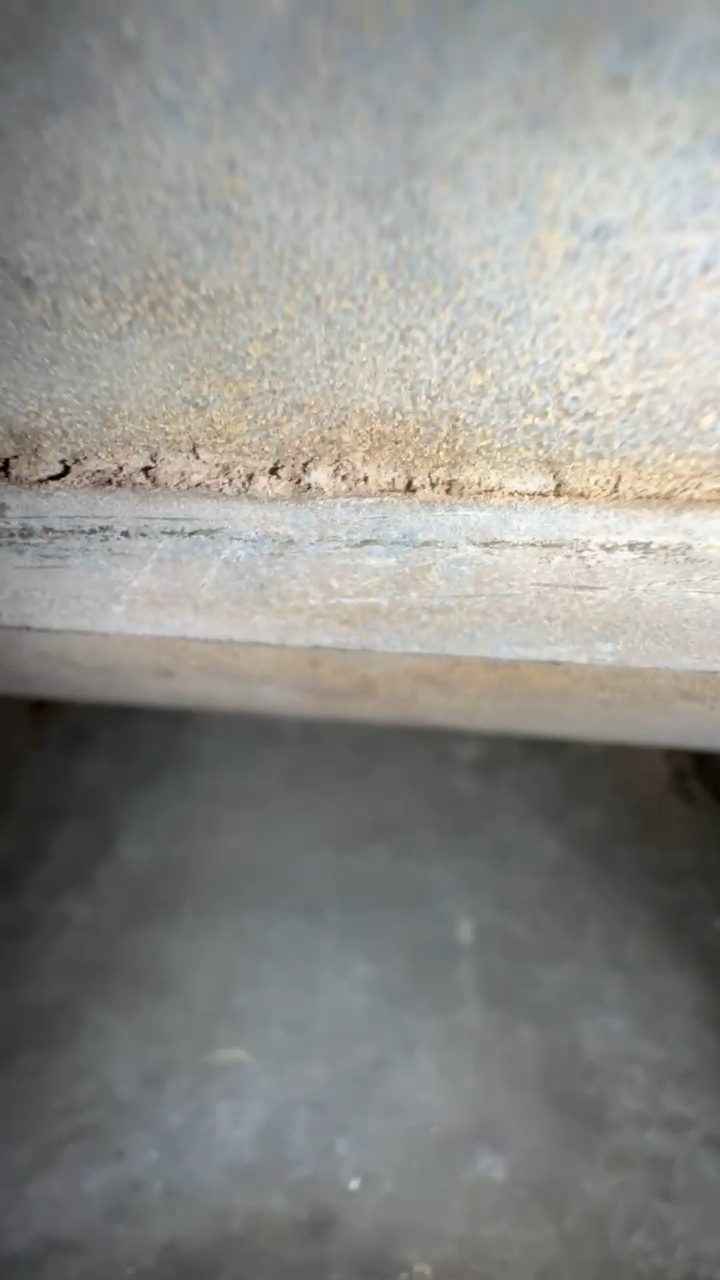 Dust coating the interior walls of a residential HVAC duct