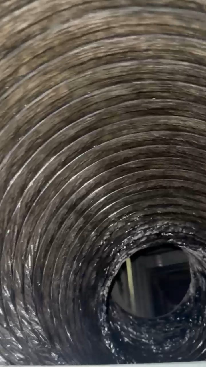 View along a cleaned duct run toward the opening