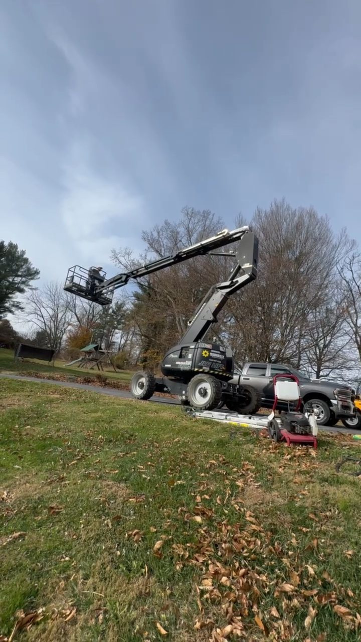 Lift equipment staged on site for chimney service